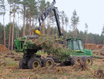 Fig. 5: On a clear-cut area in Saxony-Anhalt, the remaining logging residues are compacted with so-called bundlers and then sent for thermal utilization in a large power plant.